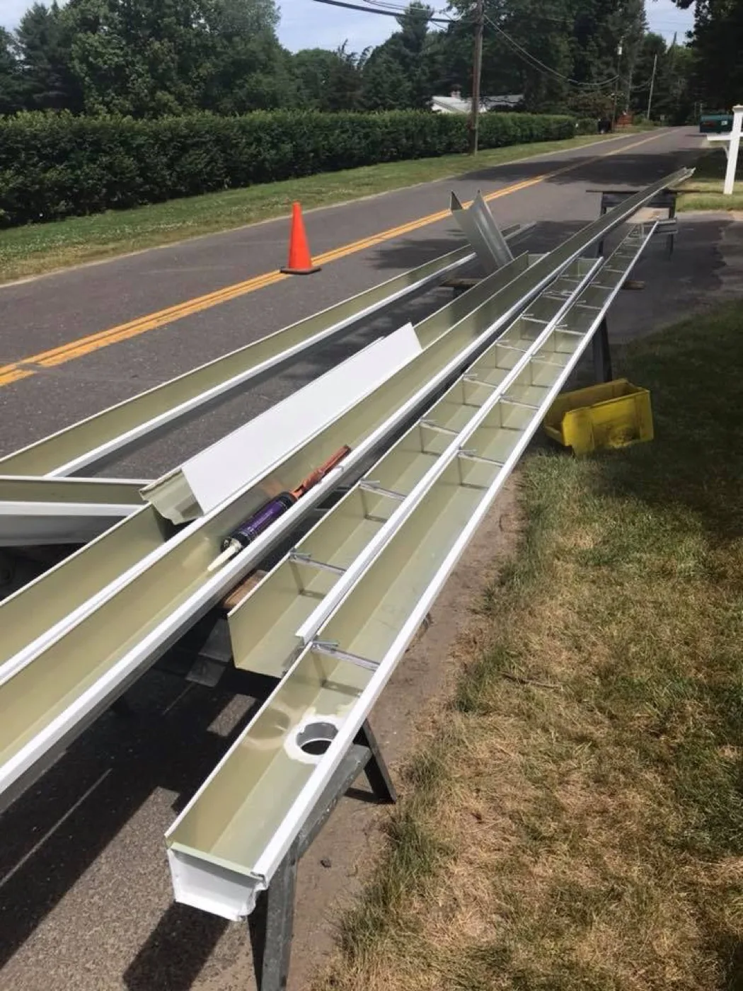Martin's Aluminum crew on a seamless gutter installation in Southbury, CT