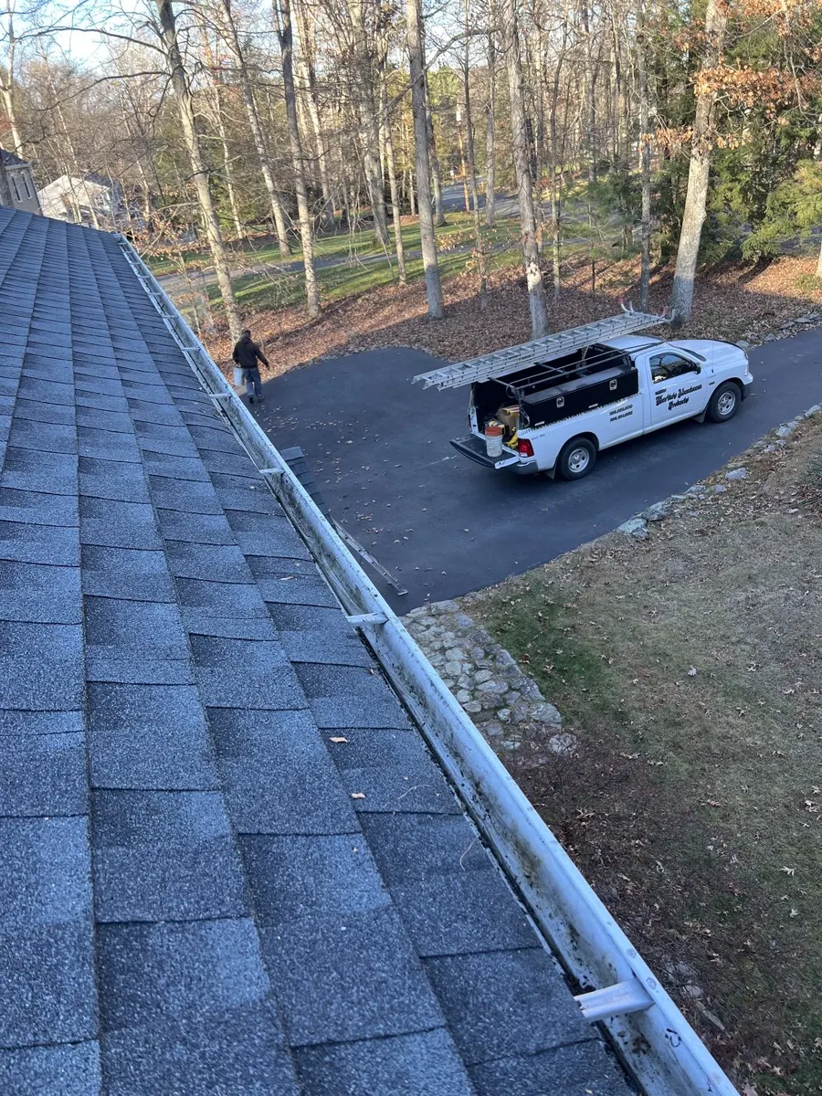 After - the same gutter run cleared and free-flowing, cleaned by Martin's Aluminum