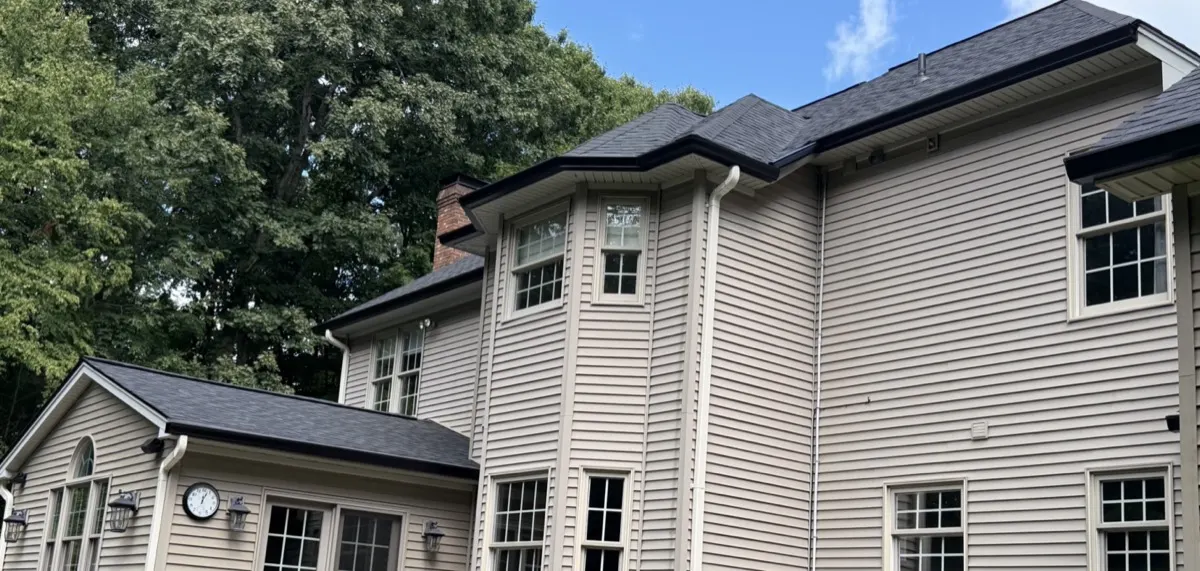 After - new architectural shingle roof and seamless gutters in Southbury, CT by Martin's Aluminum