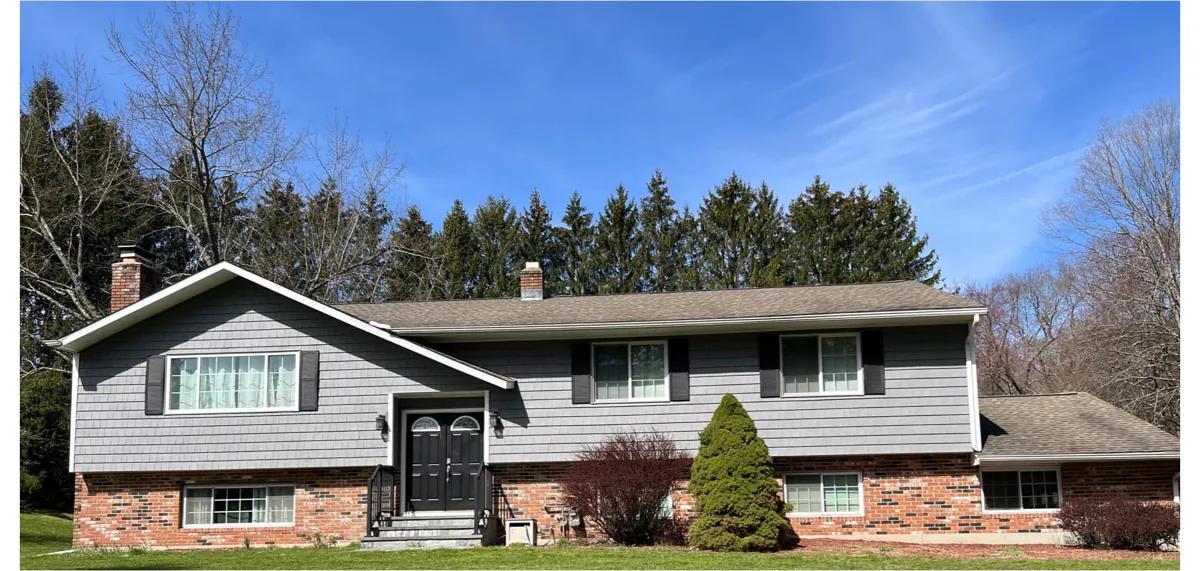 After — Vinyl Siding project in Southbury, CT by Martin's Aluminum