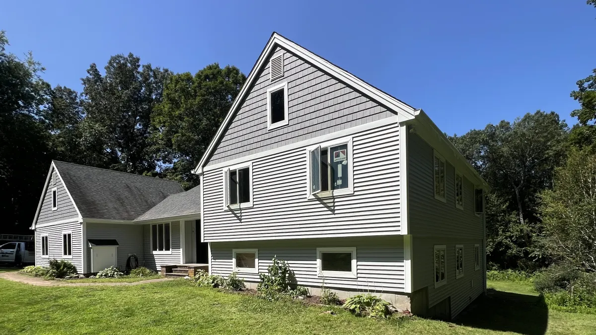 After - the same gable end in vinyl clapboard with shake accent, installed by Martin's Aluminum in Southbury, CT