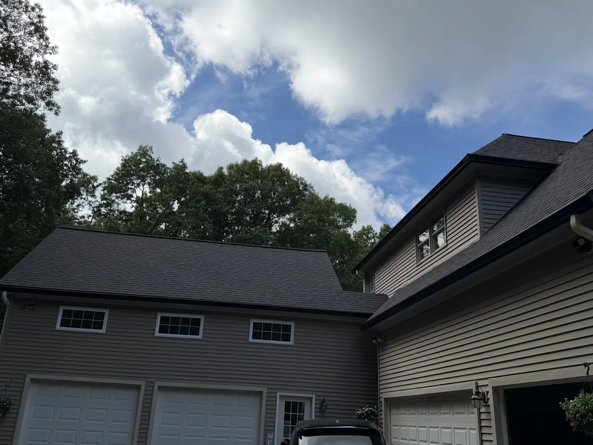 Seamless gutters on an attached garage in Southbury, CT by Martin's Aluminum